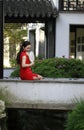 Chinese cheongsam model in Chinese classical garden